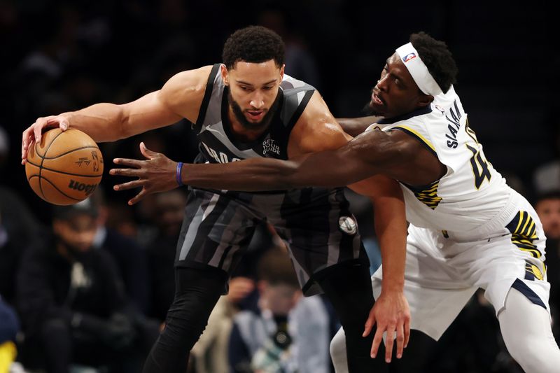 NEW YORK, NEW YORK - DECEMBER 04: Ben Simmons #10 of the Brooklyn Nets dribbles against Pascal Siakam #43 of the Indiana Pacers during the first half at Barclays Center on December 04, 2024 in the Brooklyn borough of New York City. NOTE TO USER: User expressly acknowledges and agrees that, by downloading and or using this photograph, User is consenting to the terms and conditions of the Getty Images License Agreement. (Photo by Sarah Stier/Getty Images)