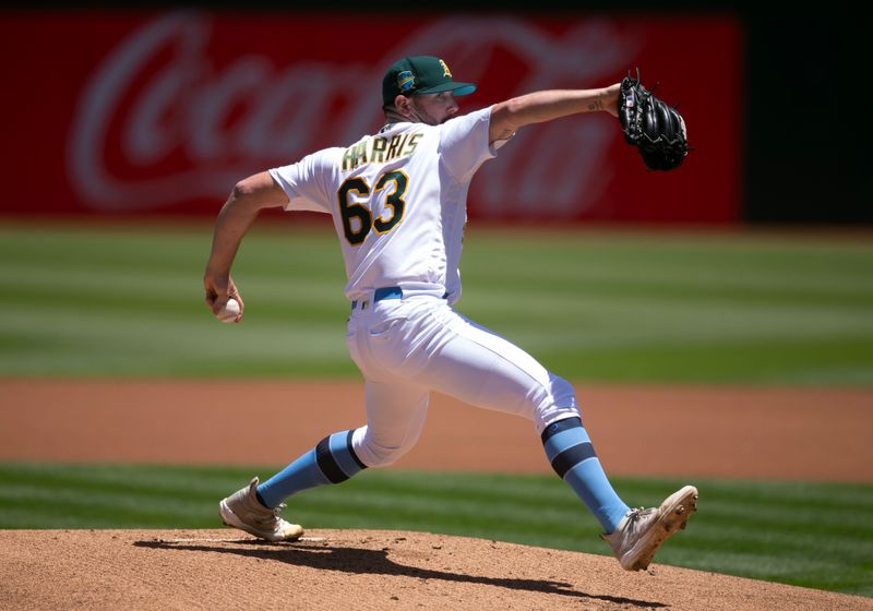 Jun 18, 2023; Oakland, California, USA; Oakland Athletics starting pitcher Hogan Harris (63) delivers a pitch against the Philadelphia Phillies during the first inning at Oakland-Alameda County Coliseum. Mandatory Credit: D. Ross Cameron-USA TODAY Sports