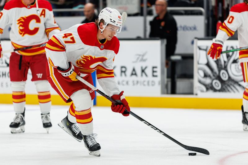 Oct 19, 2024; Seattle, Washington, USA; Calgary Flames center Connor Zary (47) warms up before the game against the Seattle Kraken at Climate Pledge Arena. Mandatory Credit: Caean Couto-Imagn Images