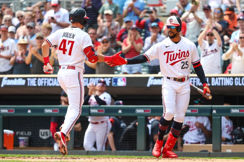 May 24, 2023; Minneapolis, Minnesota, USA; Minnesota Twins second baseman Edouard Julien (47) celebrates his solo home run with designated hitter Byron Buxton (25) against the San Francisco Giants during the first inning at Target Field. Mandatory Credit: Matt Krohn-USA TODAY Sports