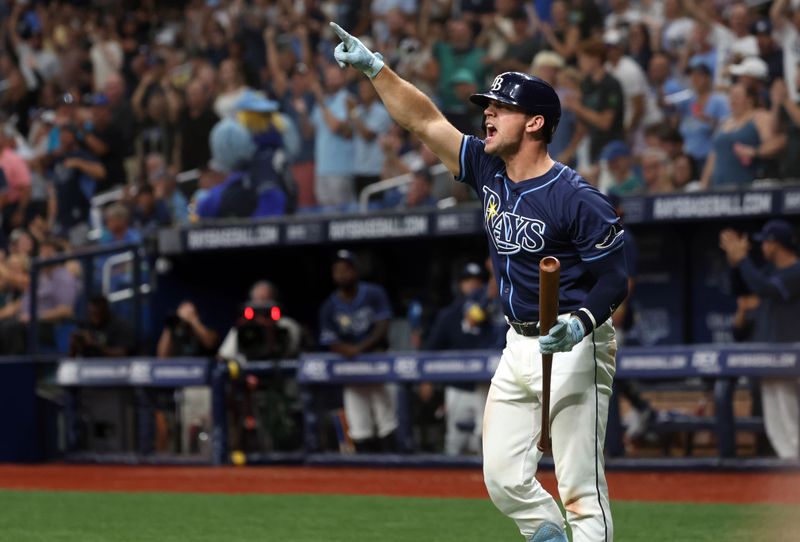 Jun 25, 2024; St. Petersburg, Florida, USA; Tampa Bay Rays catcher Ben Rortvedt (30 reacts as his teammates score against the Seattle Mariners during the sixth inning  at Tropicana Field. Mandatory Credit: Kim Klement Neitzel-USA TODAY Sports