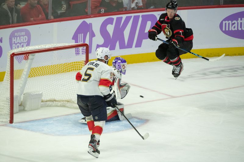 Nov 27 2023; Ottawa, Ontario, CAN; Ottawa Senators left wing Brady Tkachuk (7) jumps out of the path of the puck on a shot towards Florida Panthers goalie Sergei Bobrovsky (72) in the third period at the Canadian Tire Centre. Mandatory Credit: Marc DesRosiers-USA TODAY Sports