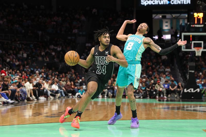 CHARLOTTE, NC - MARCH 9: Cam Thomas #24 of the Brooklyn Nets handles the ball during the game against the Charlotte Hornets on March 9, 2024 at the Spectrum Center in Charlotte, North Carolina. NOTE TO USER: User expressly acknowledges and agrees that, by downloading and or using this photograph, User is consenting to the terms and conditions of the Getty Images License Agreement.  Mandatory Copyright Notice:  Copyright 2024 NBAE (Photo by Brock Williams-Smith/NBAE via Getty Images)