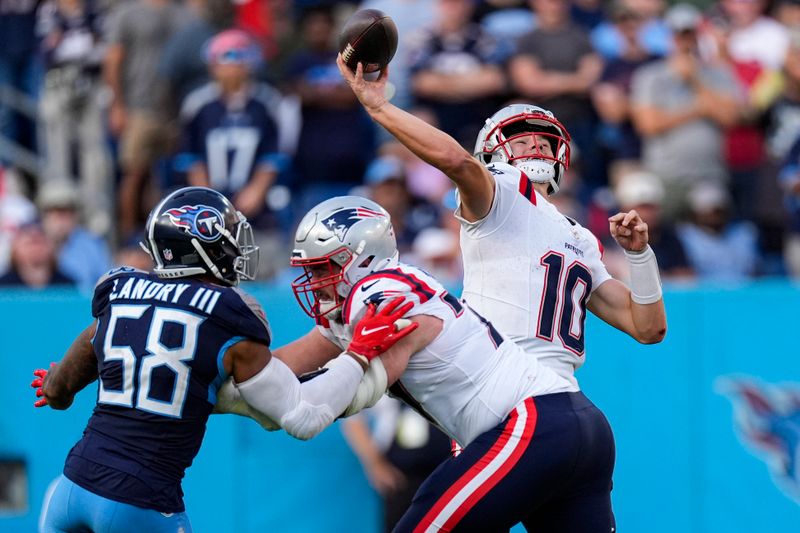 New England Patriots quarterback Drake Maye (10) throws a pass that was intercepted by the Tennessee Titans to end the game in overtime in an NFL football game in Nashville, Tenn., Sunday, Nov. 3, 2024. (AP Photo/George Walker IV)