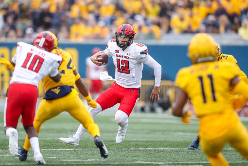 Sep 23, 2023; Morgantown, West Virginia, USA; Texas Tech Red Raiders quarterback Tyler Shough (12) runs the ball during the first quarter against the West Virginia Mountaineers at Mountaineer Field at Milan Puskar Stadium. Mandatory Credit: Ben Queen-USA TODAY Sports