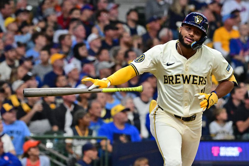 Oct 1, 2024; Milwaukee, Wisconsin, USA; Milwaukee Brewers outfielder Jackson Chourio (11) reacts after hitting into an out during the second inning against the New York Mets in game one of the Wildcard round for the 2024 MLB Playoffs at American Family Field. Mandatory Credit: Benny Sieu-Imagn Images