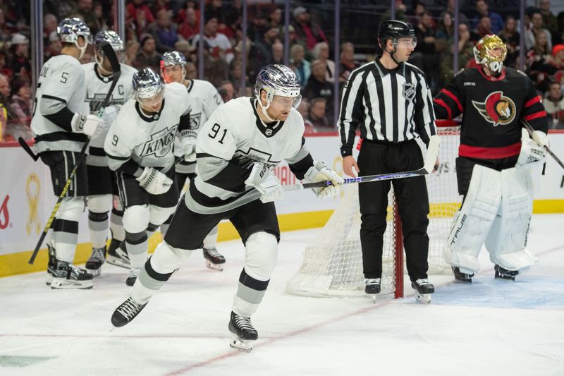 Nov 2, 2023; Ottawa, Ontario, CAN; Los Angeles Kings right wing Carl Grundstrom (91) skates to the bench after scoring in the second period against the Ottawa Senators at the Canadian Tire Centre. Mandatory Credit: Marc DesRosiers-USA TODAY Sports