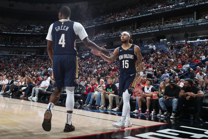 NEW ORLEANS, LA - NOVEMBER 6: Javonte Green #4 and Jose Alvarado #15 of the New Orleans Pelicans high five during the game against the Cleveland Cavaliers on November 6, 2024 at the Smoothie King Center in New Orleans, Louisiana. NOTE TO USER: User expressly acknowledges and agrees that, by downloading and or using this Photograph, user is consenting to the terms and conditions of the Getty Images License Agreement. Mandatory Copyright Notice: Copyright 2024 NBAE (Photo by Layne Murdoch Jr./NBAE via Getty Images)