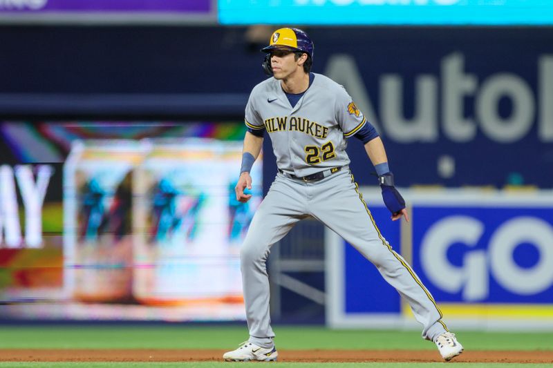 Sep 22, 2023; Miami, Florida, USA; Milwaukee Brewers left fielder Christian Yelich (22) watches from second base against the Miami Marlins during the fifth inning at loanDepot Park. Mandatory Credit: Sam Navarro-USA TODAY Sports