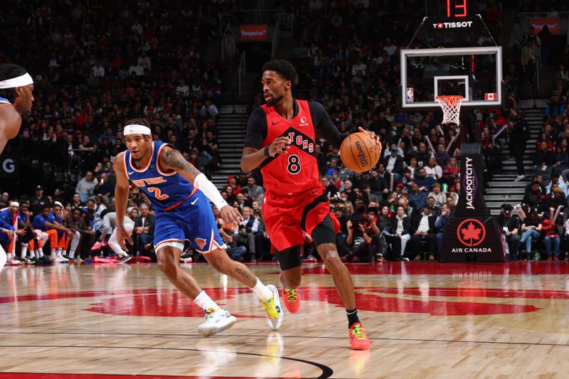 TORONTO, CANADA - MARCH 27: Kobi Simmons #8 of the Toronto Raptors dribbles the ball during the game against the New York Knicks on March 27, 2024 at the Scotiabank Arena in Toronto, Ontario, Canada.  NOTE TO USER: User expressly acknowledges and agrees that, by downloading and or using this Photograph, user is consenting to the terms and conditions of the Getty Images License Agreement.  Mandatory Copyright Notice: Copyright 2024 NBAE (Photo by Vaughn Ridley/NBAE via Getty Images)