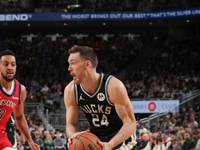 MILWAUKEE, WI - JANUARY 27:  Pat Connaughton #24 of the Milwaukee Bucks handles the ball during the game  on January 27, 2024 at the Fiserv Forum Center in Milwaukee, Wisconsin. NOTE TO USER: User expressly acknowledges and agrees that, by downloading and or using this Photograph, user is consenting to the terms and conditions of the Getty Images License Agreement. Mandatory Copyright Notice: Copyright 2024 NBAE (Photo by Gary Dineen/NBAE via Getty Images).