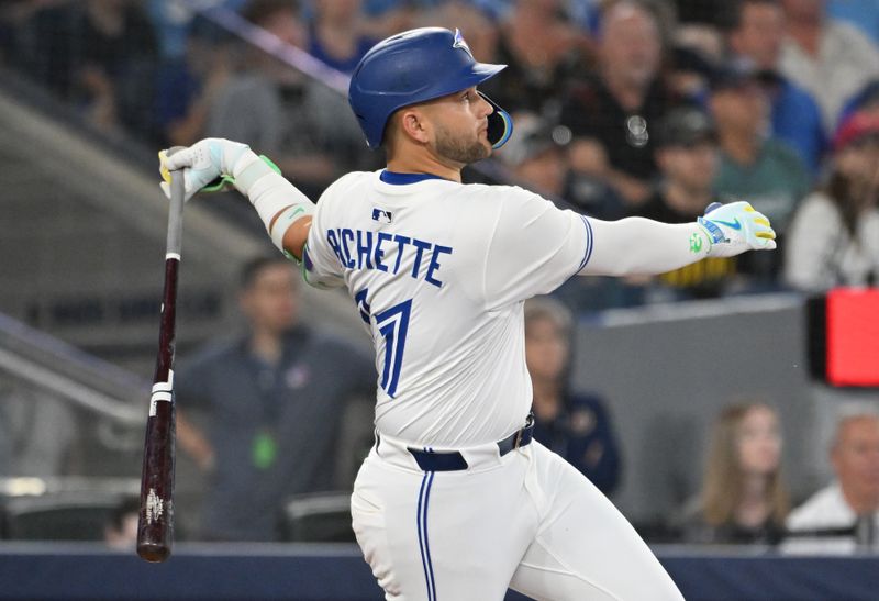 Jun 4, 2025; Toronto, Ontario, CAN;  Toronto Blue Jays shortstop Bo Bichette (11) hits a double against the Philadelphia Phillies in the sixth inning at Rogers Centre. Mandatory Credit: Dan Hamilton-Imagn Images