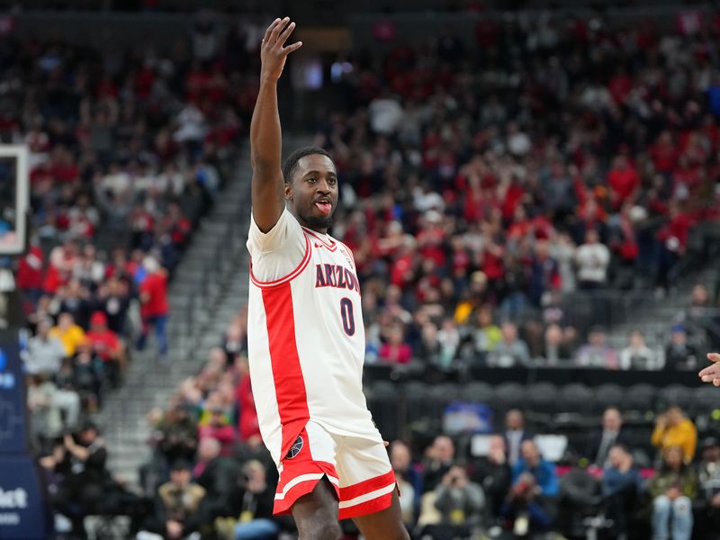 Mar 9, 2023; Las Vegas, NV, USA; Arizona Wildcats guard Courtney Ramey (0) celebrates after scoring against the Stanford Cardinal during the second half at T-Mobile Arena. Mandatory Credit: Stephen R. Sylvanie-USA TODAY Sports