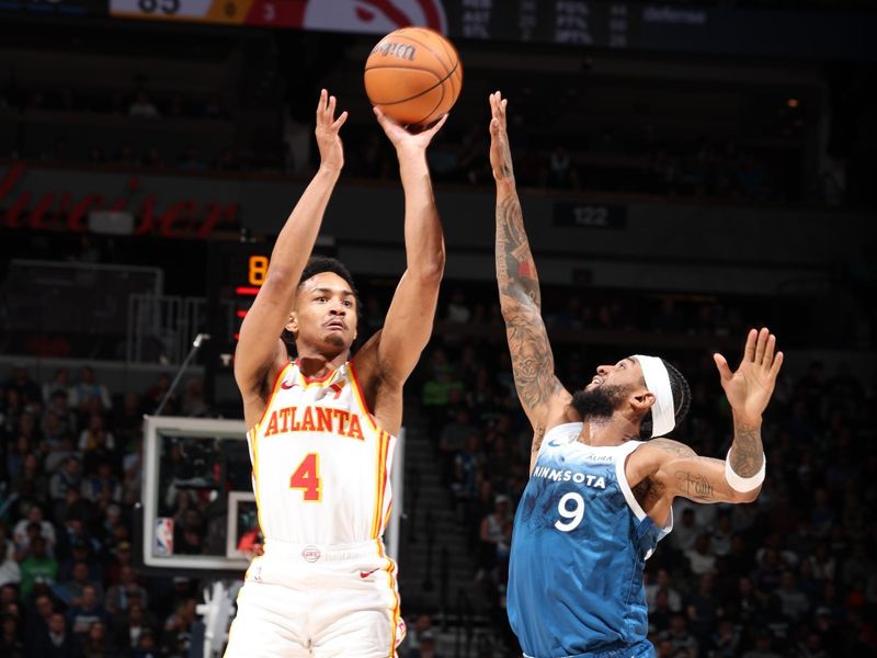 MINNEAPOLIS, MN -  APRIL 12: Kobe Bufkin #4 of the Atlanta Hawks shoots the ball during the game against the Minnesota Timberwolves on April 12, 2024 at Target Center in Minneapolis, Minnesota. NOTE TO USER: User expressly acknowledges and agrees that, by downloading and or using this Photograph, user is consenting to the terms and conditions of the Getty Images License Agreement. Mandatory Copyright Notice: Copyright 2024 NBAE (Photo by David Sherman/NBAE via Getty Images)