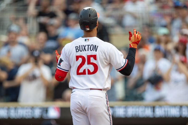 May 23, 2023; Minneapolis, Minnesota, USA; Minnesota Twins designated hitter Byron Buxton (25) celebrates after hitting a two run home run in the first inning against the San Francisco Giants at Target Field. Mandatory Credit: Jesse Johnson-USA TODAY Sports