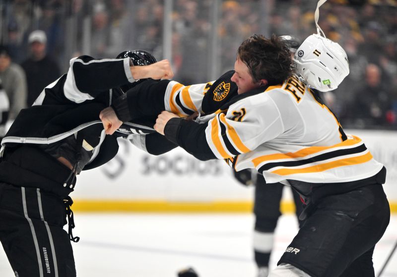 Jan 5, 2023; Los Angeles, California, USA;  Los Angeles Kings left wing Brendan Lemieux (48) and Boston Bruins center Trent Frederic (11) fight in the third period at Crypto.com Arena. Mandatory Credit: Jayne Kamin-Oncea-USA TODAY Sports