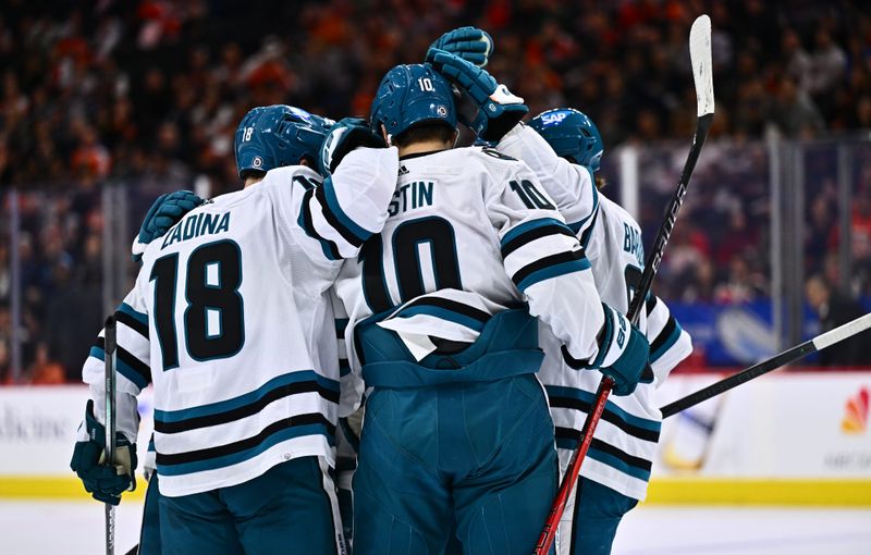 Mar 12, 2024; Philadelphia, Pennsylvania, USA; San Jose Sharks right wing Filip Zadina (18) celebrates with teammates after scoring a goal against the Philadelphia Flyers in the second period at Wells Fargo Center. Mandatory Credit: Kyle Ross-USA TODAY Sports