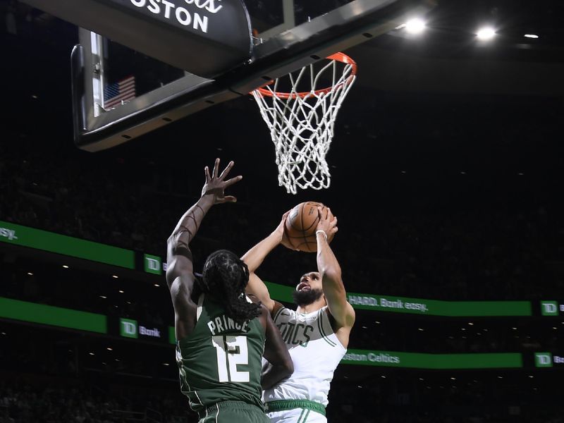 BOSTON, MA - OCTOBER 28: Derrick White #9 of the Boston Celtics shoots the ball during the game against the Milwaukee Bucks on October 28, 2024 at TD Garden in Boston, Massachusetts. NOTE TO USER: User expressly acknowledges and agrees that, by downloading and/or using this Photograph, user is consenting to the terms and conditions of the Getty Images License Agreement. Mandatory Copyright Notice: Copyright 2024 NBAE (Photo by Brian Babineau/NBAE via Getty Images)