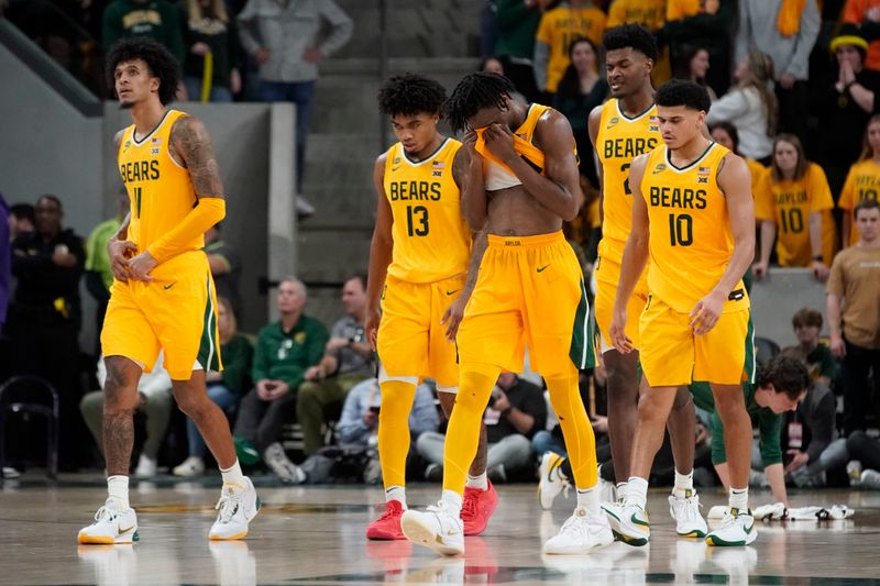 Jan 27, 2024; Waco, Texas, USA; Baylor Bears guard Ja'Kobe Walter (4) and teammates walk to the bench after a flagrant foul in TCU during the third overtime at Paul and Alejandra Foster Pavilion. Mandatory Credit: Raymond Carlin III-USA TODAY Sports