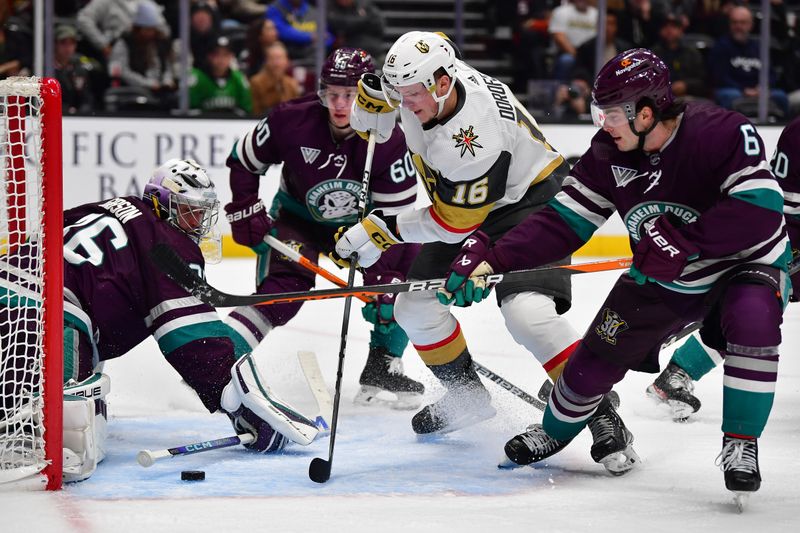 Dec 27, 2023; Anaheim, California, USA; Anaheim Ducks defenseman Jamie Drysdale (6) helps goaltender John Gibson (36) defend the goal against Vegas Golden Knights left wing Pavel Dorofeyev (16) during the second period at Honda Center. Mandatory Credit: Gary A. Vasquez-USA TODAY Sports