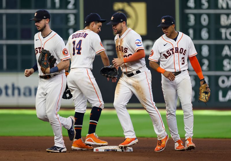 Aug 2, 2023; Houston, Texas, USA;  From left to right, Houston Astros right fielder Kyle Tucker (30) ,second baseman Mauricio Dubon (14) , center fielder Chas McCormick (20) and shortstop Jeremy Pena (3) celebrate the win against the Cleveland Guardians at Minute Maid Park. Mandatory Credit: Thomas Shea-USA TODAY Sports