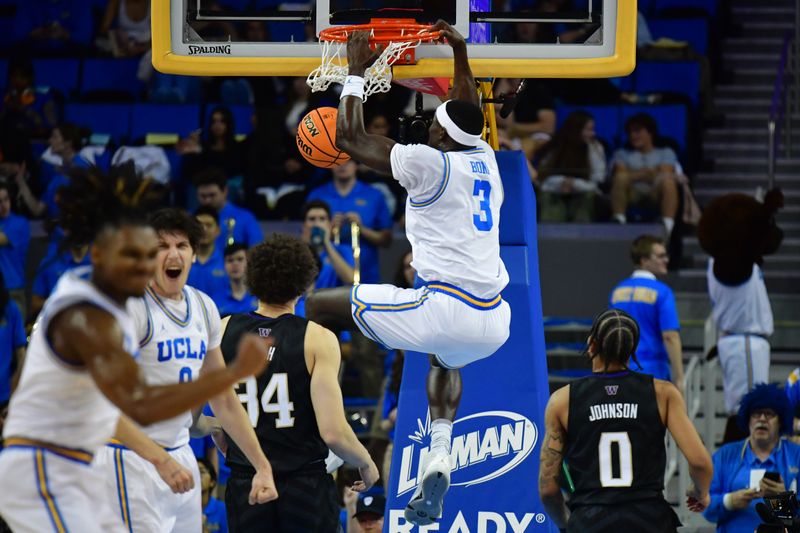 January 14, 2024; Los Angeles, California, USA; UCLA Bruins forward Adem Bona (3) dunks for the basket against the Washington Huskies during the first half at Pauley Pavilion. Mandatory Credit: Gary A. Vasquez-USA TODAY Sports