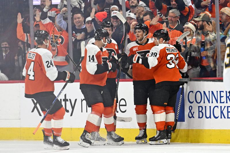 Oct 13, 2025; Philadelphia, Pennsylvania, USA; Philadelphia Flyers right wing Tyson Foerster (71) celebrates his goal with teammates against the Florida Panthers during the first period at Wells Fargo Center. Mandatory Credit: Eric Hartline-Imagn Images