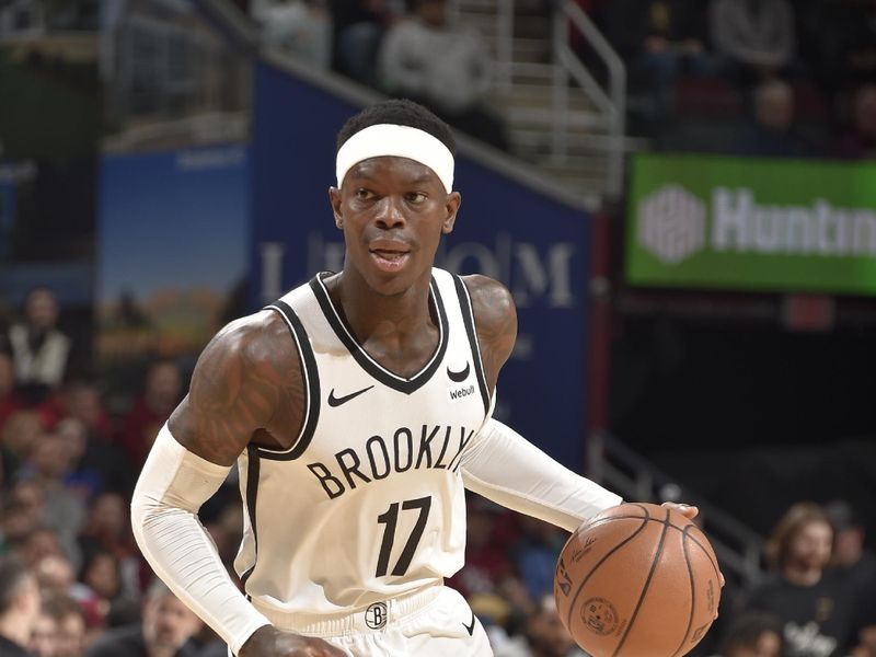 CLEVELAND, OH - MARCH 10: Dennis Schroder #17 of the Brooklyn Nets dribbles the ball during the game against the Cleveland Cavaliers on March 10, 2024 at Rocket Mortgage FieldHouse in Cleveland, Ohio. NOTE TO USER: User expressly acknowledges and agrees that, by downloading and/or using this Photograph, user is consenting to the terms and conditions of the Getty Images License Agreement. Mandatory Copyright Notice: Copyright 2024 NBAE (Photo by David Liam Kyle/NBAE via Getty Images)