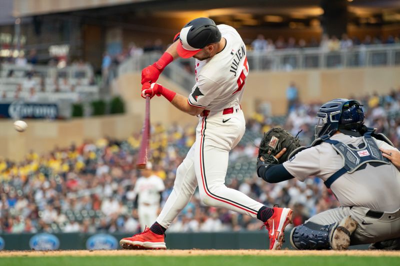 May 15, 2024; Minneapolis, Minnesota, USA; Minnesota Twins second base Edouard Julien (47) hits in the fourth inning at Target Field. Mandatory Credit: Matt Blewett-USA TODAY Sports