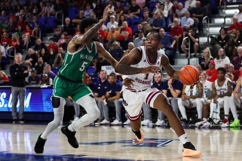 Jan 28, 2024; Boca Raton, Florida, USA; Florida Atlantic Owls guard Johnell Davis (1) drives to the basket against North Texas Mean Green guard Rondel Walker (5) during the second half at Eleanor R. Baldwin Arena. Mandatory Credit: Sam Navarro-USA TODAY Sports