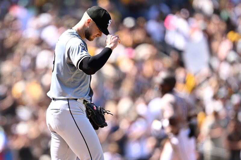 Sep 22, 2024; San Diego, California, USA; Chicago White Sox starting pitcher Sean Burke (left) reacts as San Diego Padres left fielder Jurickson Profar (right) rounds the bases after hitting a home run during the third inning at Petco Park. Mandatory Credit: Orlando Ramirez-Imagn Images