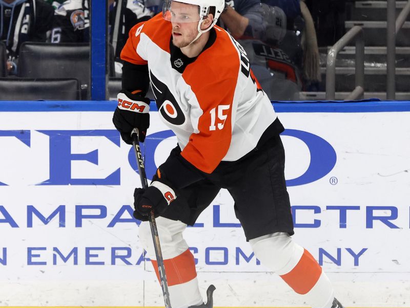 Mar 17, 2025; Tampa, Florida, USA;  Philadelphia Flyers right wing Olle Lycksell (15) skates with the puck against the Tampa Bay Lightning during the second period at Amalie Arena. Mandatory Credit: Kim Klement Neitzel-Imagn Images
