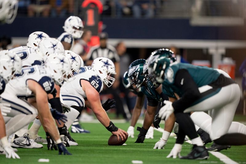 Dallas Cowboys center Tyler Biadasz (63) waits to snap the ball as they line up against the Philadelphia Eagles defense during an NFL football game in Arlington, Texas, Sunday, Dec. 10, 2023. (AP Photo/Tony Gutierrez)