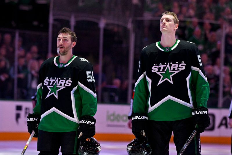 Mar 8, 2026; Dallas, Texas, USA; Dallas Stars left wing Michael Bunting (58) and defenseman Tyler Myers (57) look on before the game against the Chicago Blackhawks at the American Airlines Center. Mandatory Credit: Jerome Miron-Imagn Images