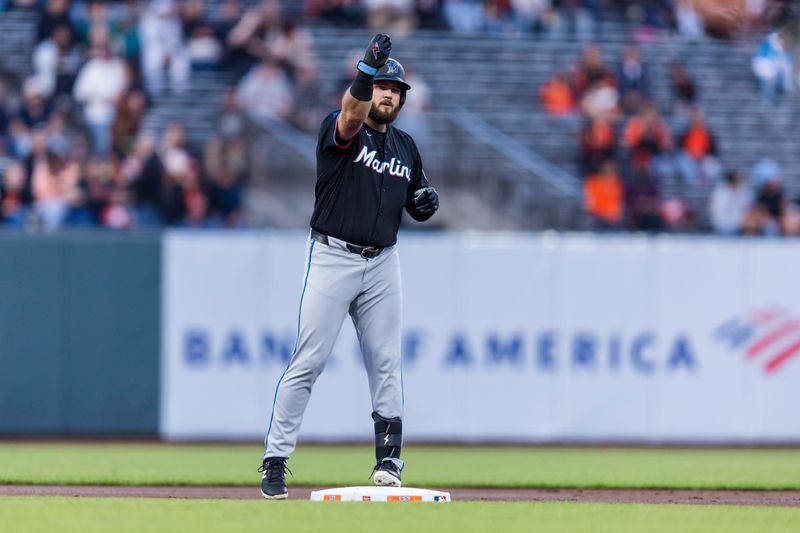 Aug 30, 2024; San Francisco, California, USA; Miami Marlins designated hitter Jake Burger (36) gestures after hitting a double against the San Francisco Giants during the first inning at Oracle Park. Mandatory Credit: John Hefti-USA TODAY Sports