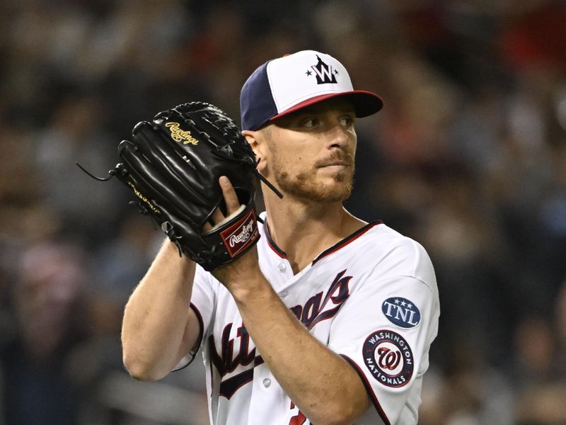 Apr 4, 2023; Washington, District of Columbia, USA; Washington Nationals starting pitcher Chad Kuhl (26) reacts after the final out of the fifth inning against the Tampa Bay Rays at Nationals Park. Mandatory Credit: Brad Mills-USA TODAY Sports