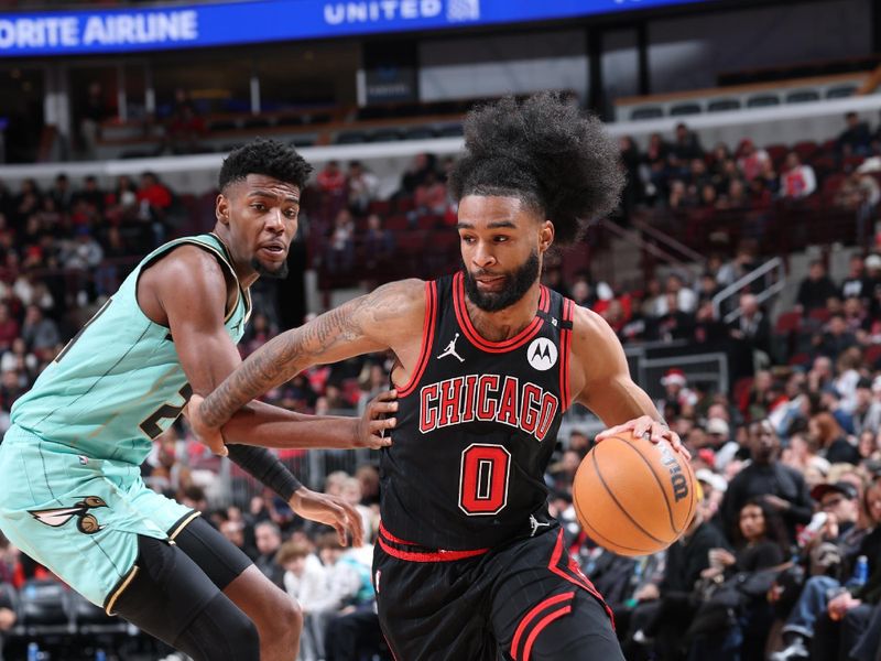 CHICAGO, IL - DECEMBER 13: Coby White #0 of the Chicago Bulls dribbles the ball during the game against the Charlotte Hornets on December 13, 2024 at United Center in Chicago, Illinois. NOTE TO USER: User expressly acknowledges and agrees that, by downloading and or using this photograph, User is consenting to the terms and conditions of the Getty Images License Agreement. Mandatory Copyright Notice: Copyright 2024 NBAE (Photo by Jeff Haynes/NBAE via Getty Images)