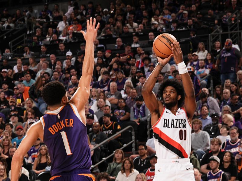 PHOENIX, AZ - NOVEMBER 2: Scoot Henderson #00 of the Portland Trail Blazers shoots a three point basket during the game against the Phoenix Suns on November 2, 2024 at Footprint Center in Phoenix, Arizona. NOTE TO USER: User expressly acknowledges and agrees that, by downloading and or using this photograph, user is consenting to the terms and conditions of the Getty Images License Agreement. Mandatory Copyright Notice: Copyright 2024 NBAE (Photo by Kate Frese/NBAE via Getty Images)