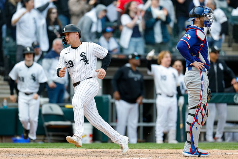 May 24, 2025; Chicago, Illinois, USA; Chicago White Sox catcher Matt Thaiss (29) scores against the Texas Rangers during the sixth inning at Rate Field. Mandatory Credit: Kamil Krzaczynski-Imagn Images