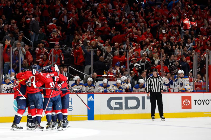 Nov 22, 2023; Washington, District of Columbia, USA; Washington Capitals right wing Tom Wilson (43) celebrates with teammates after scoring the game-tying goal against the Buffalo Sabres in the final minutes of the third period at Capital One Arena. Mandatory Credit: Geoff Burke-USA TODAY Sports