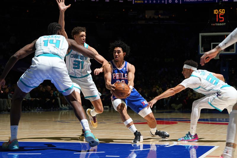 PHILADELPHIA, PA - NOVEMBER 10: Jared McCain #20 of the Philadelphia 76ers handles the ball during the game against the Charlotte Hornets on November 10, 2024 at the Wells Fargo Center in Philadelphia, Pennsylvania NOTE TO USER: User expressly acknowledges and agrees that, by downloading and/or using this Photograph, user is consenting to the terms and conditions of the Getty Images License Agreement. Mandatory Copyright Notice: Copyright 2024 NBAE (Photo by Jesse D. Garrabrant/NBAE via Getty Images)