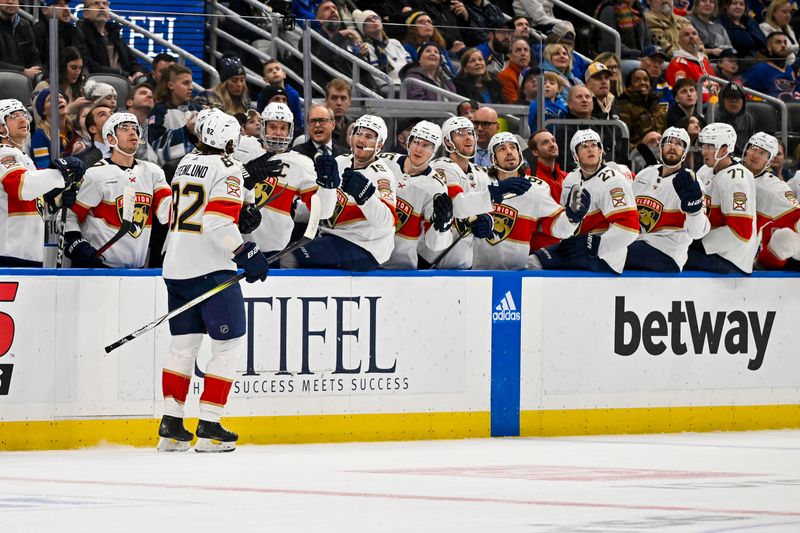 Jan 9, 2024; St. Louis, Missouri, USA;  Florida Panthers center Kevin Stenlund (82) is congratulated by teammates after scoring against the St. Louis Blues during the first period at Enterprise Center. Mandatory Credit: Jeff Curry-USA TODAY Sports