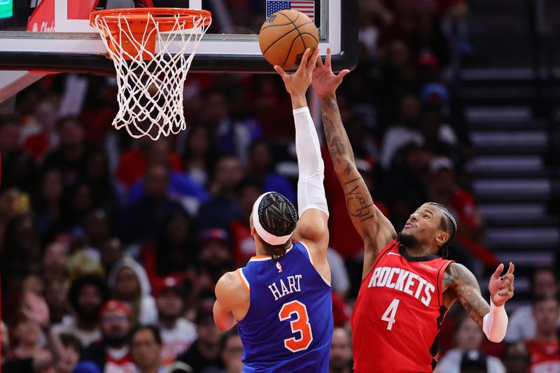 HOUSTON, TEXAS - NOVEMBER 04: Jalen Green #4 of the Houston Rockets guards Josh Hart #3 of the New York Knicks at the hoop during the second half at Toyota Center on November 04, 2024 in Houston, Texas. NOTE TO USER: User expressly acknowledges and agrees that, by downloading and or using this photograph, User is consenting to the terms and conditions of the Getty Images License Agreement.  (Photo by Alex Slitz/Getty Images)