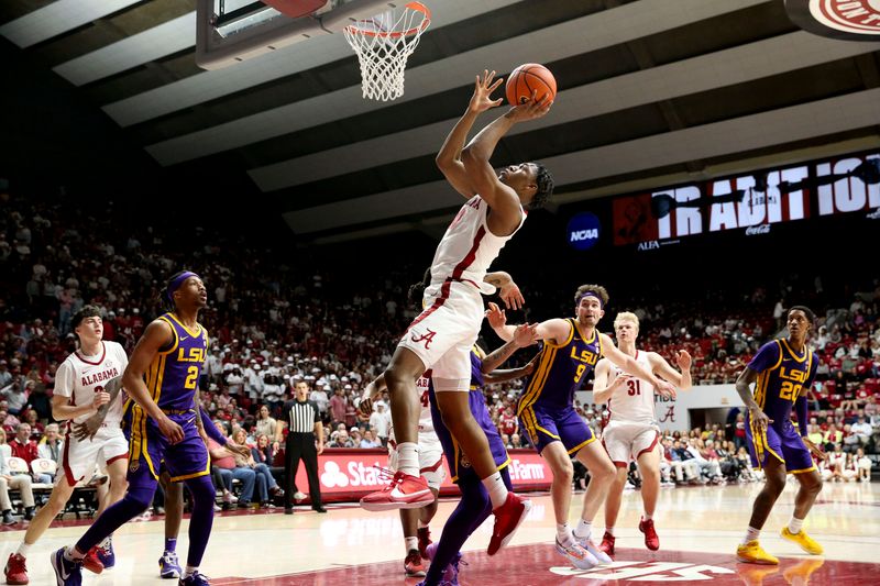 Jan 27, 2024; Tuscaloosa, Alabama, USA;  Alabama forward Mouhamed Dioubate (10) scores inside against LSU at Coleman Coliseum. Alabama defeated LSU 109-88. Mandatory Credit: Gary Cosby Jr.-USA TODAY Sports