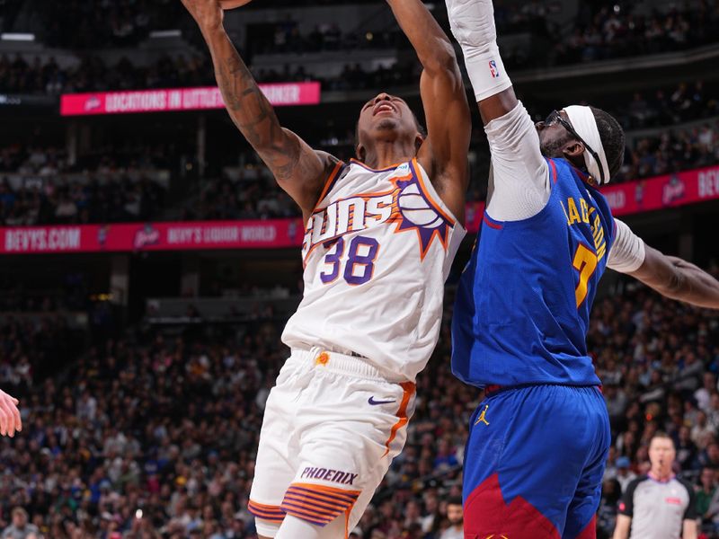 DENVER, CO - MARCH 5: Saben Lee #38 of the Phoenix Suns drives to the basket during the game against the Denver Nuggets on March 5, 2024 at the Ball Arena in Denver, Colorado. NOTE TO USER: User expressly acknowledges and agrees that, by downloading and/or using this Photograph, user is consenting to the terms and conditions of the Getty Images License Agreement. Mandatory Copyright Notice: Copyright 2024 NBAE (Photo by Bart Young/NBAE via Getty Images)