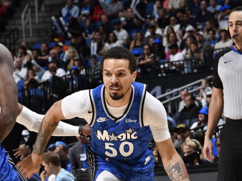 ORLANDO, FL - APRIL 14: Cole Anthony #50 of the Orlando Magic handles the ball during the game against the Milwaukee Bucks on April 14, 2024 at Kia Center in Orlando, Florida. NOTE TO USER: User expressly acknowledges and agrees that, by downloading and or using this photograph, User is consenting to the terms and conditions of the Getty Images License Agreement. Mandatory Copyright Notice: Copyright 2024 NBAE (Photo by Fernando Medina/NBAE via Getty Images)