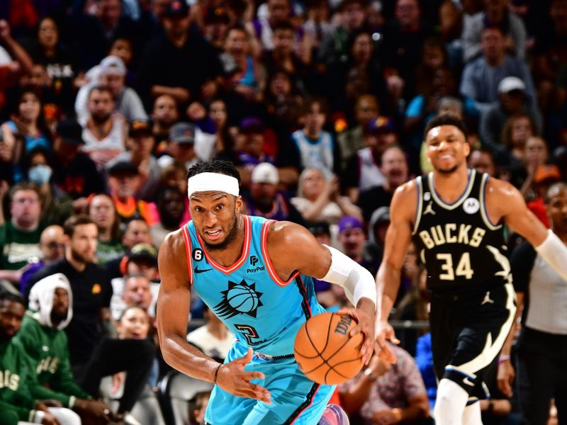 PHOENIX, AZ - MARCH 14: Josh Okogie #2 of the Phoenix Suns dribbles the ball up court against the Milwaukee Bucks on March 14, 20223at Footprint Center in Phoenix, Arizona. NOTE TO USER: User expressly acknowledges and agrees that, by downloading and or using this photograph, user is consenting to the terms and conditions of the Getty Images License Agreement. Mandatory Copyright Notice: Copyright 2023 NBAE (Photo by Barry Gossage/NBAE via Getty Images)