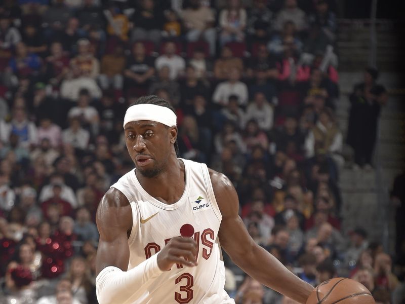 CLEVELAND, OH - MARCH 11: Caris LeVert #3 of the Cleveland Cavaliers handles the ball during the game against the Phoenix Suns on March 11, 2024 at Rocket Mortgage FieldHouse in Cleveland, Ohio. NOTE TO USER: User expressly acknowledges and agrees that, by downloading and/or using this Photograph, user is consenting to the terms and conditions of the Getty Images License Agreement. Mandatory Copyright Notice: Copyright 2024 NBAE (Photo by David Liam Kyle/NBAE via Getty Images)