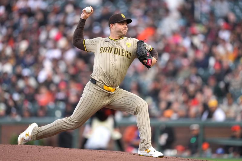 Apr 6, 2024; San Francisco, California, USA; San Diego Padres starting pitcher Michael King (34) throws a pitch against the San Francisco Giants during the first inning at Oracle Park. Mandatory Credit: Darren Yamashita-USA TODAY Sports