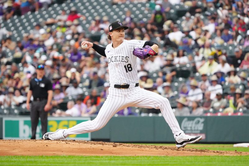 Jul 21, 2024; Denver, Colorado, USA; Colorado Rockies starting pitcher Ryan Feltner (18) delivers a pitch in the fourth inning against the San Francisco Giants at Coors Field. Mandatory Credit: Ron Chenoy-USA TODAY Sports